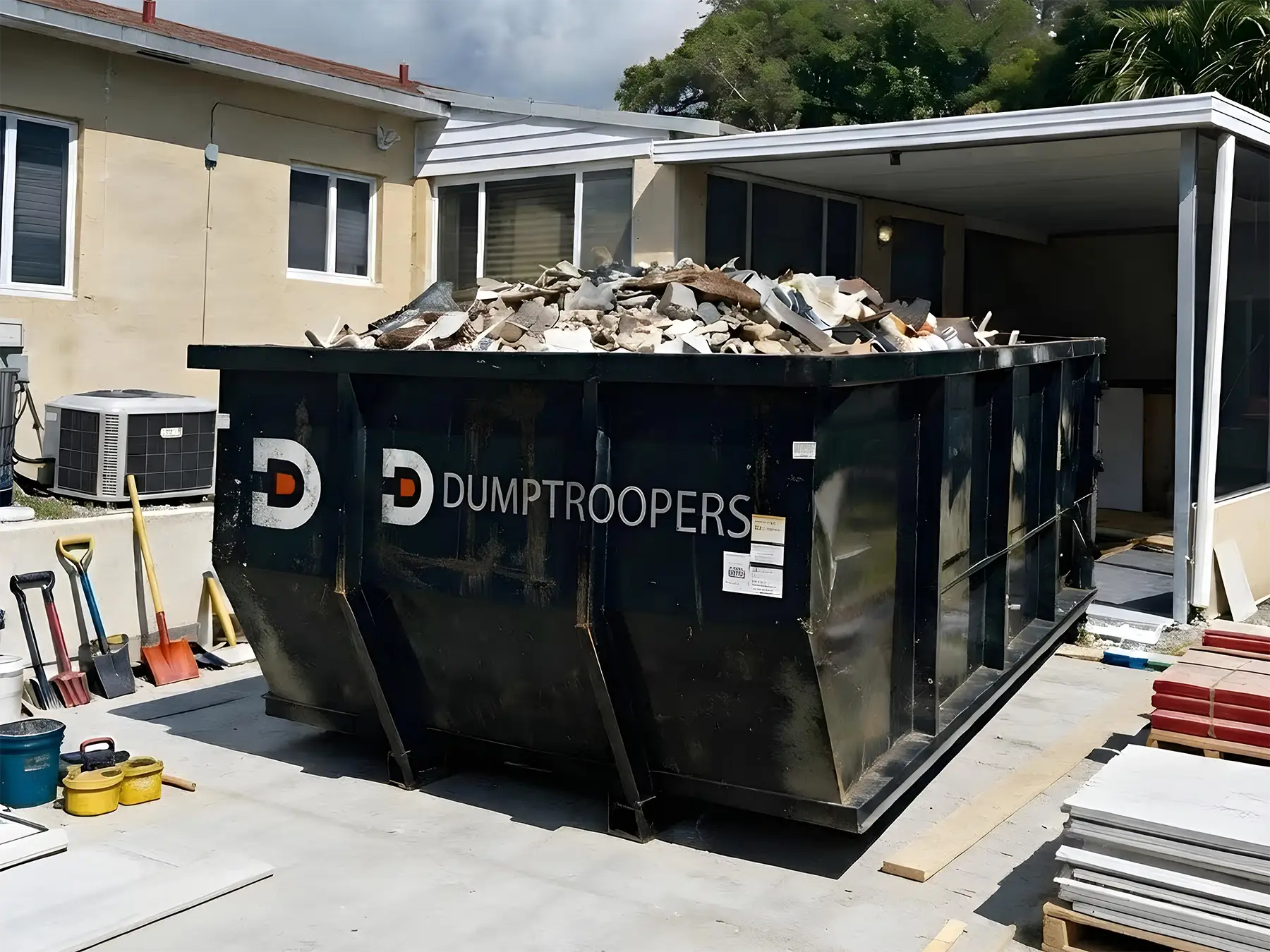20 yard roll-off dumpster on a Miami job site