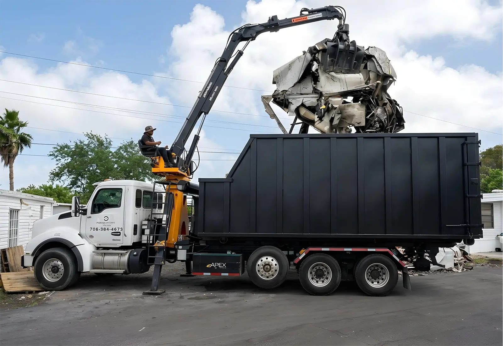 Dump Troopers grapple truck and crew on a Miami commercial job site